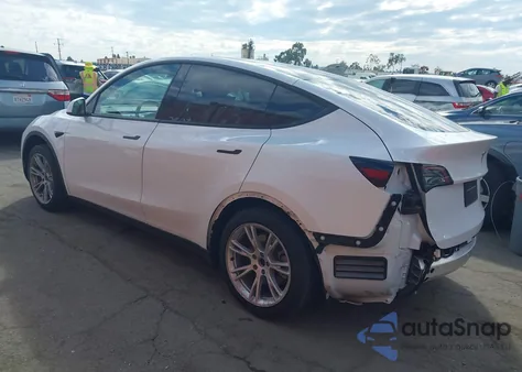 2021 Tesla Model Y Standard Range Rear-Wheel Drive from USA, damaged, VIN 5YJYGDED0MF133544